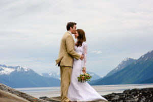 bride and groom at bird point in Girdwood alaska