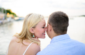 couple sitting on dock on lake Mendota