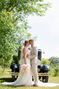 Mary + Garret in Rustic Wisconsin Wedding with Model T Ford Car
