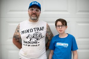 a father and son pose for a photo in Chicago Illinois