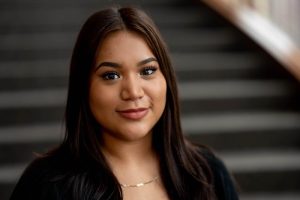 Edgewood college student portrait in predolin lobby
