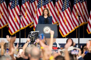 Vice President Kamala Harris stands at a podium at her first official campaign stop in Wauwatosa, Wisconsin.